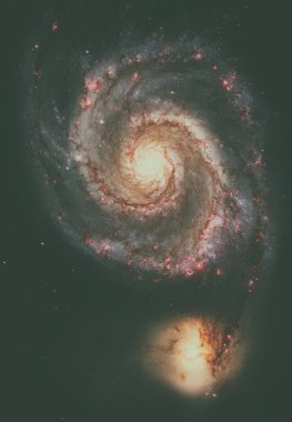 Girdap Galaksisi. Görkemli sarmal galaksinin zarif kolları.