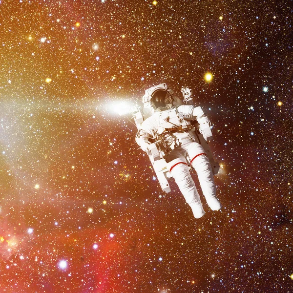 Astronaut in outer space. Nebula on the background. — Stock Photo, Image