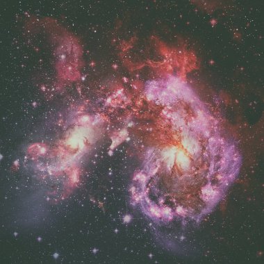 Spiral galaksi ve uzay nebulası.