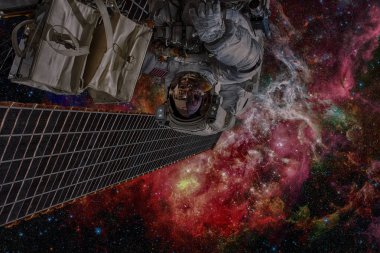 Astronot uzayda. Uzay yürüyüşü. Nasa tarafından döşenmiş bu görüntü unsurları