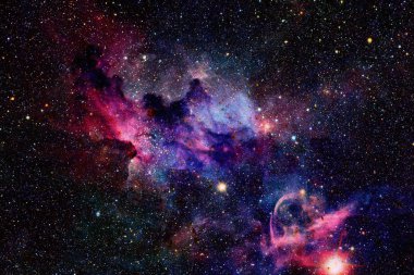 Nebula ve galaksiler uzayda. Bu görüntünün elementleri NASA tarafından desteklenmektedir.