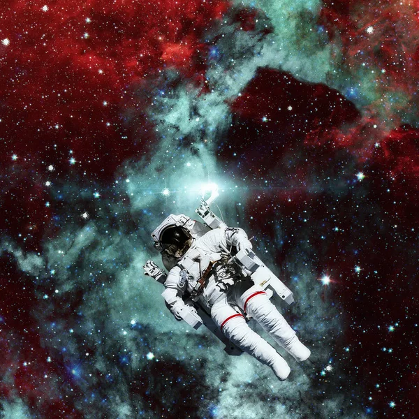 Astronautów w przestrzeni kosmicznej. Mgławica i gwiazd na tle. — Zdjęcie stockowe