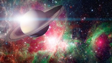 Satürn ve halka sistemi. Bu görüntünün elementleri NASA tarafından desteklenmektedir.