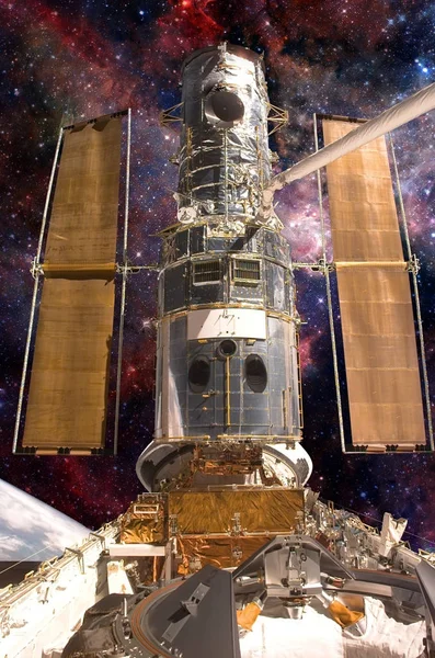 The Hubble Space Telescope. Elements of this image furnished by NASA.