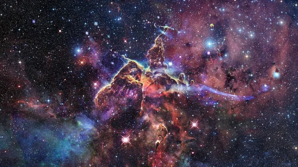 Mystic Mountain. Region in the Carina Nebula imaged by the Hubble Space Telescope. Elements of this image furnished by NASA.