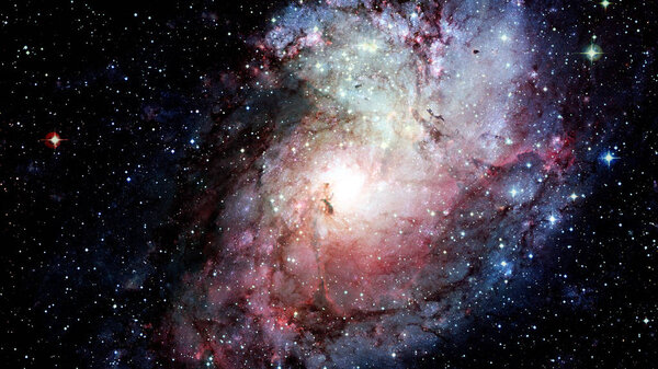 Спиральная галактика. Элементы этого изображения предоставлены НАСА