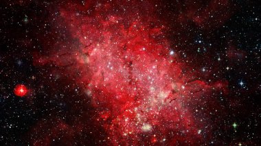 Ekstrem yıldız kümesi yeni Hubble görüntüsüyle yaşama doğru patlar. Bu görüntünün elementleri NASA tarafından desteklenmektedir