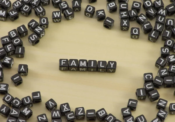 A palavra família em segundo plano — Fotografia de Stock