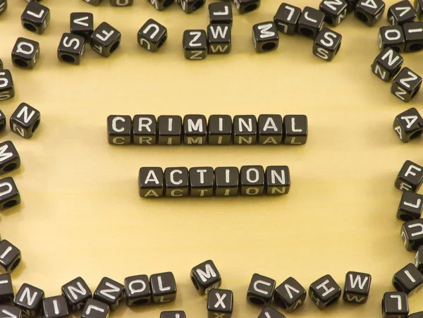 La palabra acción criminal sobre fondo de madera —  Fotos de Stock