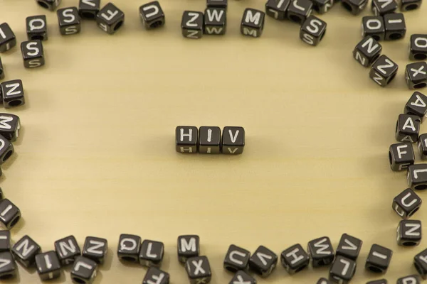 La palabra VIH en el fondo de madera —  Fotos de Stock