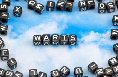 The word Warts on the sky background clipart