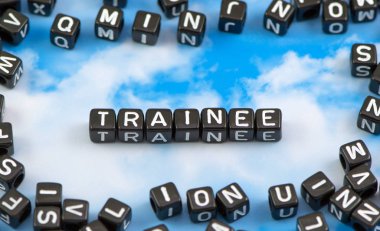 The word trainee on the sky background clipart
