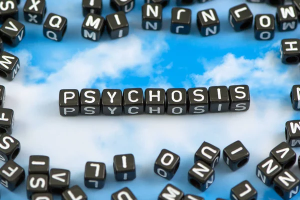 Ordet psykos på sky bakgrunden — Stockfoto