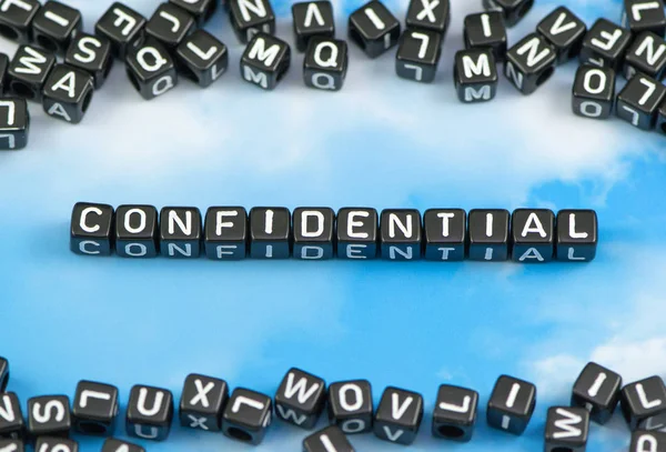 The word confidential on the sky background — Stock Photo, Image