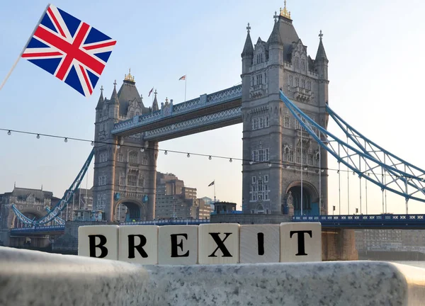 Concept brexit with UK flag on the background of the Tower Bridge in London
