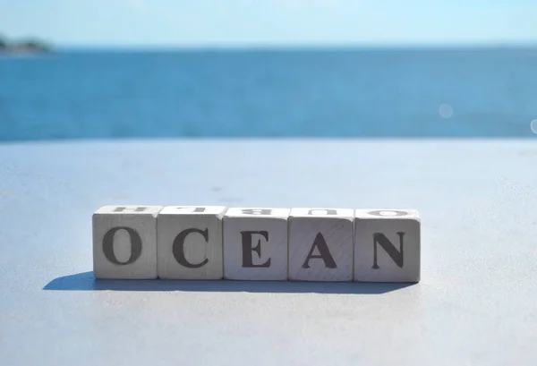 Ocean słowo na tle ocean — Zdjęcie stockowe