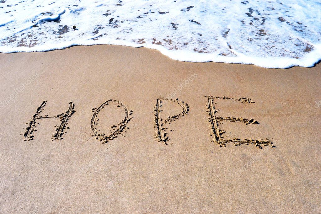 A word of hope on the beach background