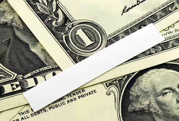 White blank for text on background of dollars — Stock Photo, Image