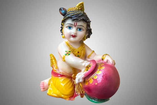 Hindu God Krishna in childhood (Gopal) porcelain statuette