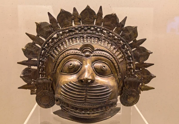 Indian bronze face mask from the Bhuta tribe and folk people of Karnataka, India.