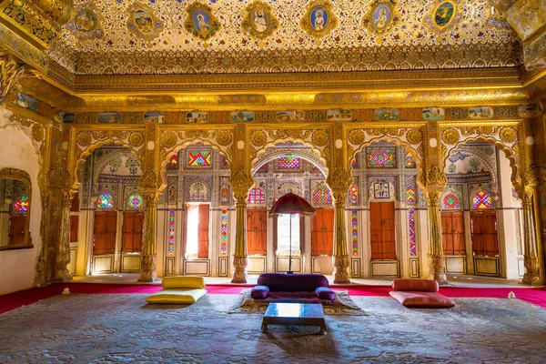 Golden royal palace room with architectural details and carvings at Mehrangarh Fort, Jodhpur. Mehrangarh fort, located in Jodhpur, Rajasthan, is one of the largest forts in India built in the year 1459