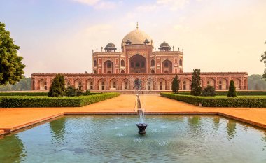 Humayun Tomb built in the year 1572 is a medieval red sandstone and white marble architecture at Delhi India designated as a UNESCO World Heritage site clipart