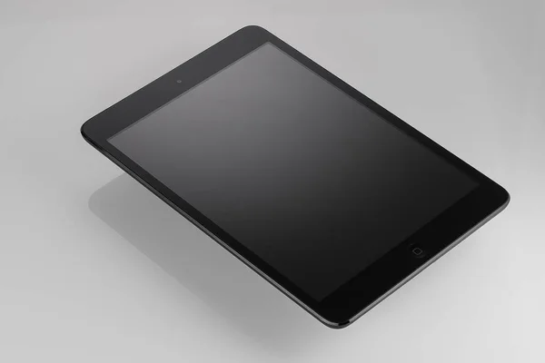 Black a tablet on a white background — Stock Photo, Image