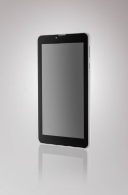 Bir tablet karanlık bir arka plan üzerinde siyah