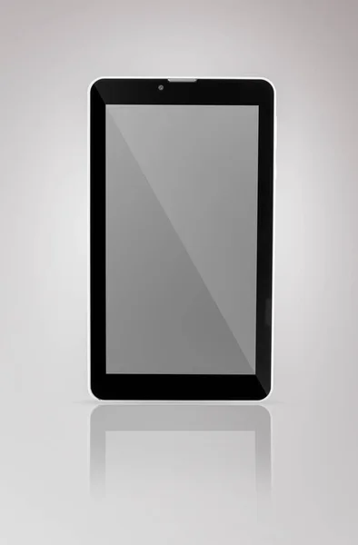 Черный планшет на темном фоне — стоковое фото
