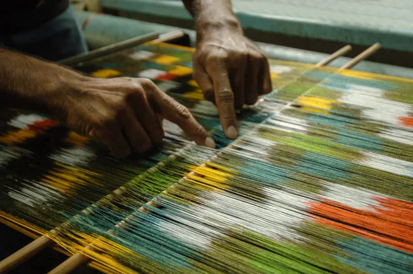 production and weaving of carpets and fabrics