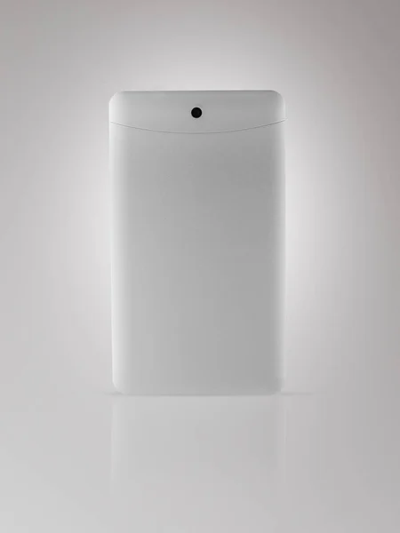 Sisi belakang tablet pada latar belakang cahaya — Stok Foto