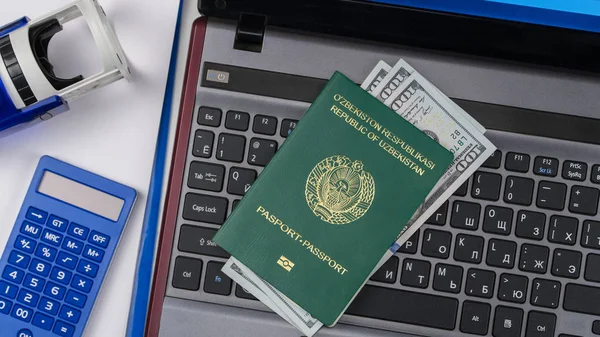 Passport of Uzbekistan on the keyboard — Stock Photo, Image