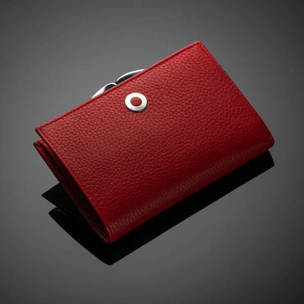 Women's wallet on a black background — Stock Photo, Image