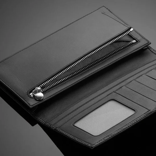 Men's wallet on a black background — Stock Photo, Image