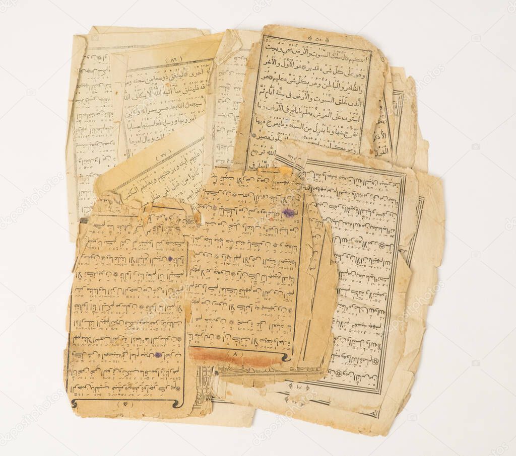 ancient old sheets of paper from the Arabic book, the Koran