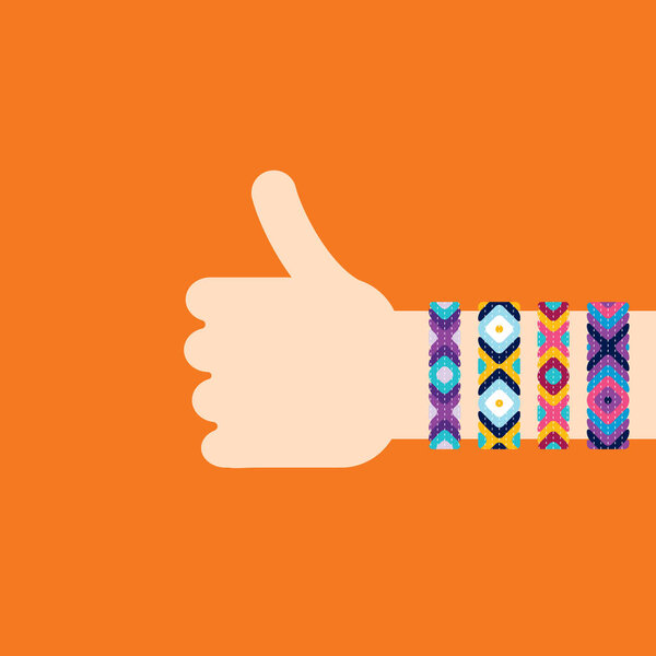 Hitchhiking hand with hippy friendship bracelets