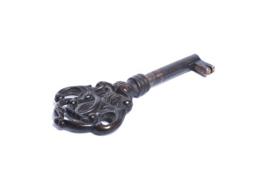Closeup of an old key, showing heavy usage marks. Isolated on white.