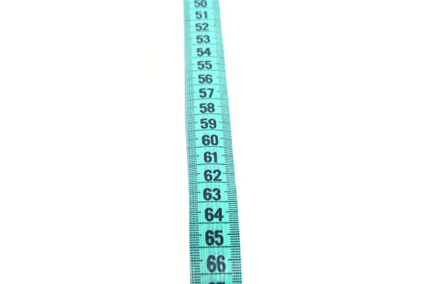 Vista de perto da fita métrica azul isolada sobre fundo branco — Fotografia de Stock