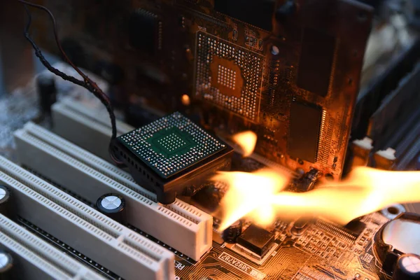 Fire Burning ,blazing computer motherboard, cpu,gpu and video card, processor on circuit board with electronic — Stock Photo, Image