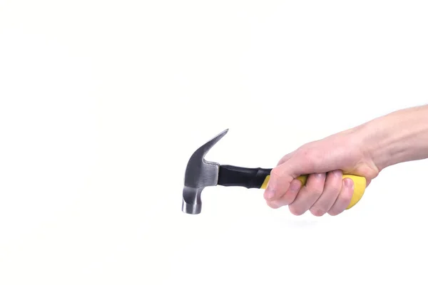 Hand holds hammer isolated on white background — Stock Photo, Image