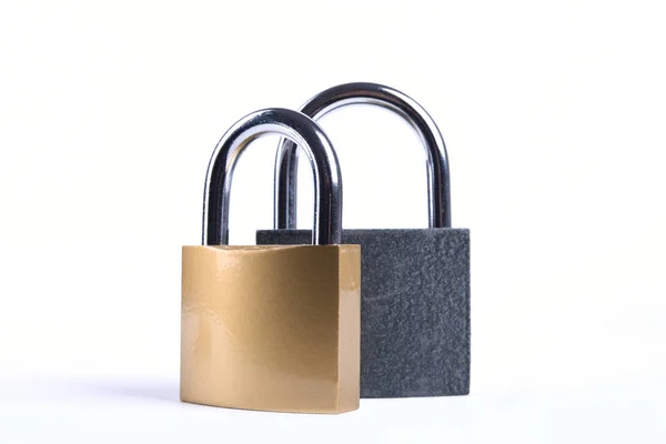 Two Locked grey and golden Padlock on the white background. — 스톡 사진