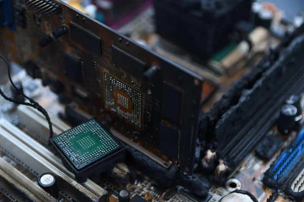 Desktop Computer Burned Damage after fire Burning CPU GPU video card, memory, chip , cooler — Stock Photo, Image