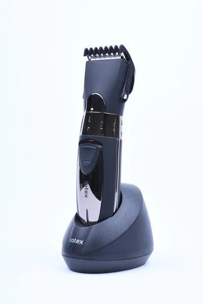 Wireless hair trimmer and beard isolated on the a white background. Hair dryer