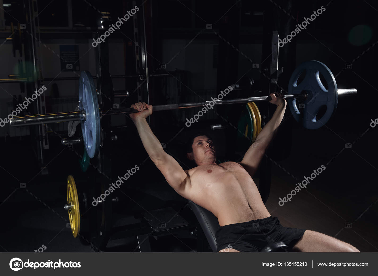 Muscular Man Doing Heavy Exercise Athletic Man Pumping Up Muscles