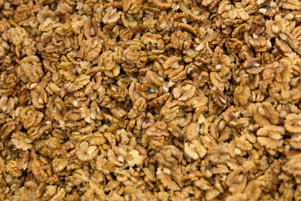 Close up of peeled walnuts pile, background. — Stock Photo, Image