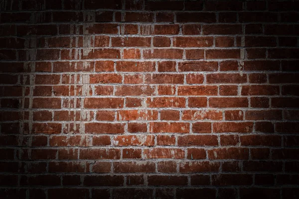 Textura de pared de ladrillo rojo grunge fondo con esquinas vignetted —  Fotos de Stock