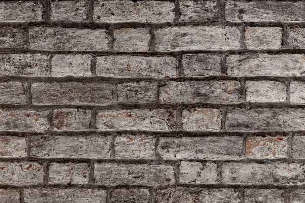 Sfondo del vecchio muro di mattoni sporchi vintage con intonaco peeling — Foto Stock