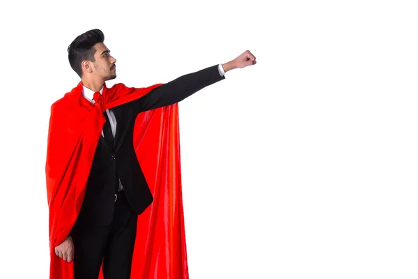 Бизнесмен в красном плаще супергероя поднимает руку — стоковое фото
