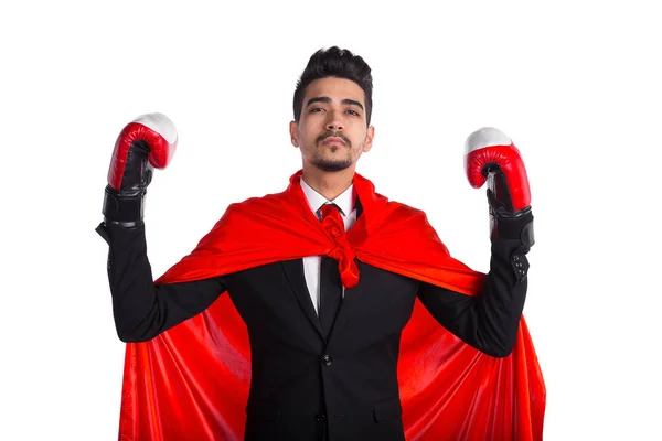 Молодой бизнесмен в боксёрских перчатках и супергеройский красный плащ — стоковое фото