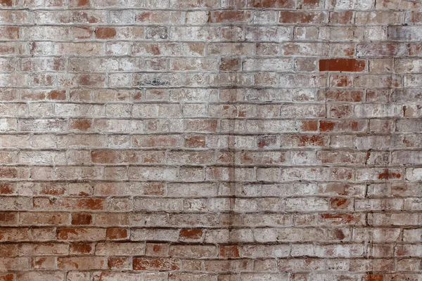 Fondo de la vieja pared de ladrillo sucio vintage con yeso pelado — Foto de Stock